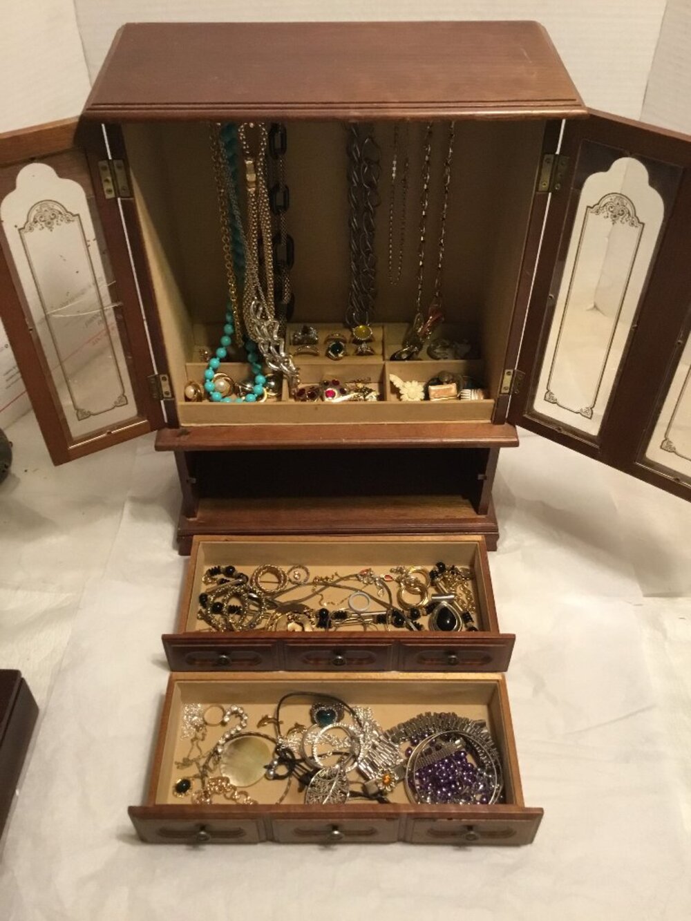 Vintage & tall wooden jewelry box filled with lots of old jewelry